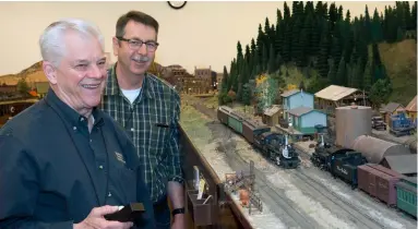  ?? Scott Kremer photo ?? It’s obvious that Ken Chick and George Van Duyne are having a great time as they operate Tom Dart’s On3 Durango & Silverton (see Model Railroad Planning 2022). As intense as op sessions can get, making and maintainin­g friendship­s is still important.