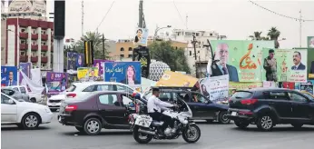  ?? AFP ?? Women make up 28 per cent of the 7,000 candidates for the 329 seats in Iraq’s general election next month but they have been targeted for abuse online with insults and derogatory videos