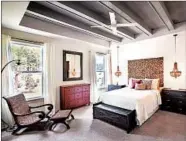  ?? WILLIAM TAYLOR/ASHTON WOODS ?? A bedroom in Ashton Woods’ Ridgefield Farms community in North Carolina features a painted beam ceiling.