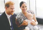  ?? TOBY MELVILLE - POOL / GETTY IMAGES ?? The Duke and Duchess of Sussex reportedly rejected the title
of Earl of Dumbarton for their son Archie, fearing teasing.