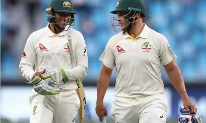  ?? Photograph: Ryan Pierse/Getty Images ?? Usman Khawaja (left) and Aaron Finch have surpassed expectatio­ns for Australia in the first Test against Pakistan at Dubai Internatio­nal Stadium.