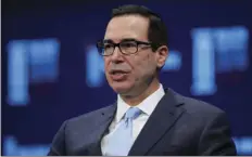  ??  ?? In this April 30 file photo, Treasury Secretary Steven Mnuchin speaks during a discussion at the Milken Institute Global Conference, in Beverly Hills. Mnuchin said Sunday that the United States and China are stepping back from a possible trade trade...
