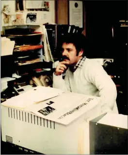  ?? COURTESY PHOTOS ?? Jim Smith at his desk at the Fort Bragg Advocate-News.