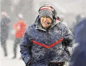  ?? Winslow Townson/TNS ?? Then-New England Patriots head coach Bill Belichick looks on from the sidelines at Gillette Stadium on Jan. 7 in Foxborough, Mass.