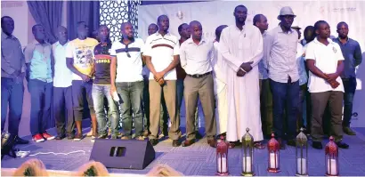  ?? Photo by Shihab ?? Non-Muslims line up to take their Shahada (declaratio­n of belief) during the event ‘Join us in the pleasure of fasting’ organised by the Islamic Informatio­n Center, at the Dar Al Ber Society auditorium in Dubai. —