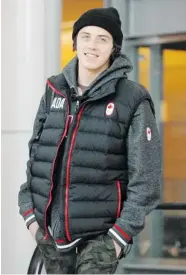  ?? MICHAEL BELL/Leader-Post ?? Mark McMorris smiles upon arriving at the Regina Internatio­nal Airport on Saturday where he was given a round ofapplause from people there to pick up passengers.