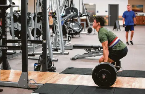  ?? Brett Coomer / Houston Chronicle ?? Nick Siebert builds muscle at the VillaSport Athletic Club and Spa in Cypress. VillaSport has five clubs in the United States.