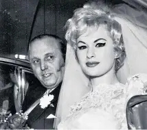  ??  ?? g Monroe lookalike: Mariella, 18, and Horace ‘Hod’ Dibben, 56, on their wedding day in January 1960