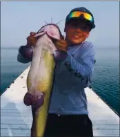  ?? COURTESY PHOTO ?? Eleven-year-old Hyden Brown of Kelseyvill­e caught this 37-pound catfish last week out of Clear Lake.