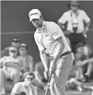  ?? TODAY SPORTS ?? Webb Simpson putts on the 17th green during Friday’s second round of The Players Championsh­ip golf tournament at TPC Sawgrass Stadium Course. JASEN VINLOVE/USA