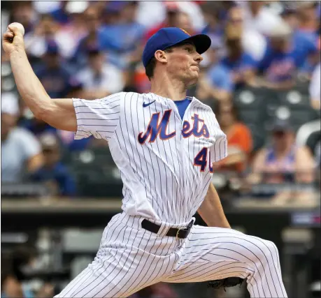  ?? ?? New York Mets starting pitcher Chris Bassitt throws during the first inning of a baseball game against the Philadelph­ia Phillies, Sunday, Aug. 14, 2022, in New York. (AP Photo/Julia Nikhinson)