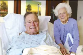  ?? AP ?? Former US president George H.W. Bush and his wife Barbara pose for a photo at the Houston Methodist Hospital on Monday.