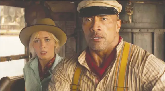  ?? PHOTOS: DISNEY ?? Dwayne Johnson's riverboat captain Frank Wolff takes Emily Blunt's Lily Houghton on a wild adventure in Jungle Cruise.