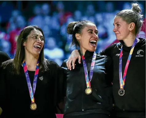  ?? GETTY IMAGES ?? Silver Ferns coach Noeline Taurua, left, with Maria Folau and Casey Kopua after winning the Netball World Cup in July.