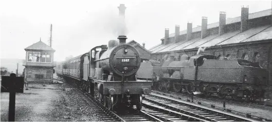  ??  ?? This view of an up train entering Hellifield was captured by Norman Hindle on 21 September 1935 as Compound No 1137 brings in an all-stations stopping train from Carlisle, bound for either Leeds or Bradford. To the right is the four-road former Midland Railway engine shed, with a Johnson ‘3P’ in steam on the sand house siding. Carrying a 12B shedplate for Carlisle Upperby, No 1137 was built by the North British Locomotive Co, first entering traffic in July 1925, and it remained in use until April 1956. To the left is Hellifield North Junction signal box, which survived into the 1960s, before being demolished, leaving the still extant Hellifield South Junction box in use out of the original two Midland and one L&YR signal boxes.