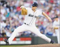  ?? John Froschauer / Associated Press ?? Seattle Mariners starting pitcher Wade LeBlanc works against the Boston Red Sox during the eighth inning Saturday in Seattle. The Mariners won 1-0.