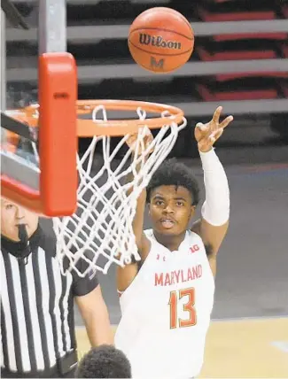  ?? KIM HAIRSTON/THE BALTIMORE SUN ?? Maryland’s Hakim Hart scores in the first quarter against Saint Peter’s at the Xfinity Center on Friday.