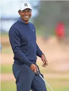  ?? THOMAS J. RUSSO / USA TODAY SPORTS ?? Tiger Woods is a big fan of the links golf that the British Open features.