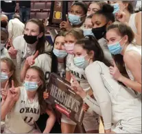  ?? PETE BANNAN — MEDIANEWS GROUP ?? The 2021PIAA Class 5A state champion Cardinal O’Hara Lions gather for a trophy shot after defeating Chartiers Valley 51-27in Hershey last March. Now comes a rematch of the teams, again for a PIAA title.