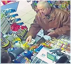  ??  ?? Sergei Skripal hands over cash in the Salisbury shop