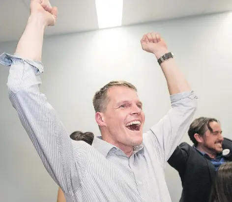  ?? LIAM RICHARDS ?? Charlie Clark celebrates as election results roll in Wednesday, making it clear he is Saskatoon’s next mayor.