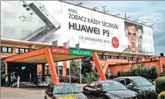  ?? CHEN XU / CHINA DAILY ?? An ad for the Chinese telecom giant Huawei in the center of Warsaw.