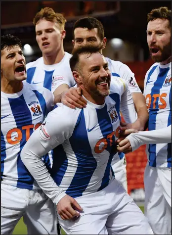  ??  ?? Kilmarnock’s Kris Boyd celebrates after his goal from the penalty spot drew Killie level. Picture: SNS