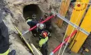  ?? AFP/Getty Images ?? First responders inspect a tunnel discovered after the collapse of part of a road in central Rome. Photograph: Vigili del Fuoco/