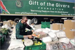  ?? PICTURE: MATTHEWS BALOYI ?? Dr Imtiaz Sooliman, founder of Gift of the Givers, a relief organisati­on which has worked in disaster areas all over the world over the past 25 years, packs emergency supplies.