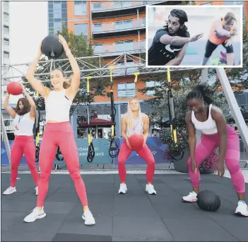  ??  ?? FIGHTING FIT Stretch class at the Sweat Fitness Festival, Gunwharf Quays