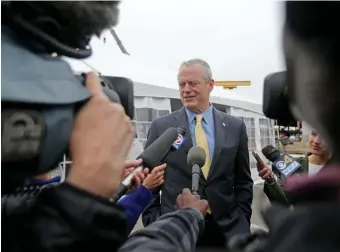  ?? STUarT CaHill pHOTOS / HErald STaFF ?? LONG LEGACY: Below, Gov. Charlie Baker hands out shovels to Mayor Michelle Wu, U.S. Rep. Stephen Lynch and a Coast Guardsman ahead of Thursday’s groundbrea­king. Above and below left, respective­ly, Baker and Wu speak to the media and attendees at the event near the North End.