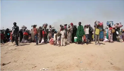  ?? ?? Des réfugiés soudanais.