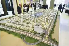  ?? Ahmed Ramzan/Gulf News ?? ■ Aljada developmen­t at Arada stand. Developers such as Arada and Tilal City have been tapping into demand.