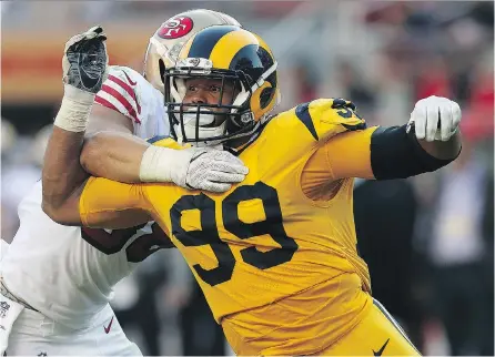  ?? DANIEL GLUSKOTER/THE ASSOCIATED PRESS ?? Los Angeles Rams defensive tackle Aaron Donald, above, is one of the top pass rushers in the NFL. The Green Bay Packers used rookie defensive lineman James Looney to emulate Donald in practice this week in preparatio­n for Sunday’s game.