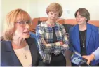  ?? BILL GLAUBER / MILWAUKEE JOURNAL SENTINEL ?? U.S. Sen. Tammy Baldwin (center) listens during an interview with fellow Democratic senators Maggie Hassan of New Hampshire (left) and Amy Klobuchar of Minnesota on Saturday.