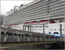  ?? BECKY BOHRER THE ASSOCIATED PRESS ?? Passengers stream off the Norwegian Bliss after the vessel arrived in Juneau, Alaska on Monday. It is the first large cruise ship of the season to arrive in Alaska.