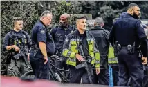  ?? JOHN SPINK / JSINK@AJC.COM ?? Two police officers responding to the shooting as backup brought long guns. It was a rifle round that hit the man, ending the shootout near Piedmont Park, Maj. Michael O’Connor said. Dozens of rounds were fired, and two officers were grazed.