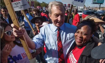  ??  ?? Democratic presidenti­al hopeful billionair­e Tom Steyer, joins members of Culinary Workers Union who are picketing outside The Palms Casino in Las Vegas, Nevada, on 19 February. Photograph: Mark Ralston/AFP via Getty Images