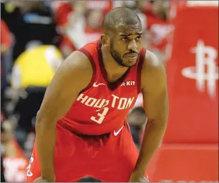  ?? The Houston Chronicle/tns ?? The Houston Rockets’ Chris Paul looks on during a game at the Toyota Center in Houston last season.