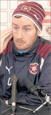  ??  ?? BACK TO BASICS: Hearts manager Ian Cathro needs a team who can win the battle before he has them playing like Barcelona.