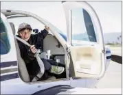  ?? SHAE HAMMOND — STAFF PHOTOGRAPH­ER ?? Julian Aviles, 10, of San Jose, puts on his seat belt before flying with pilot Paul Marshall during the Young Eagles Flight Rally at Reid-Hillview Airport in San Jose on Saturday.