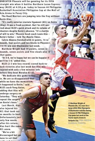  ?? PBA MEDIA BUREAU PHOTO ?? Matthew Wright of Phoenix (No. 35) soars for a layup while Mike Digregorio of Blackwater watches during a Season 44 PBA Philippine Cup game last week at the Ynares Sports Arena in Antipolo City.