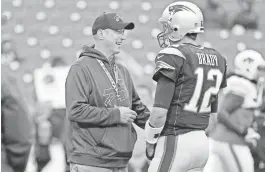  ??  ?? Jim Kelly talks to Tom Brady in Orchard Park, New York, during the 2016 season.