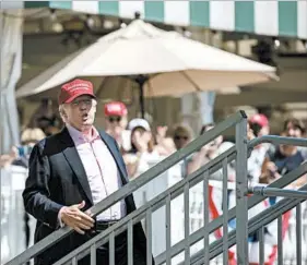  ?? CAROLYN KASTER/AP ?? President Donald Trump appears Sunday at the U.S. Women’s Open golf tournament.