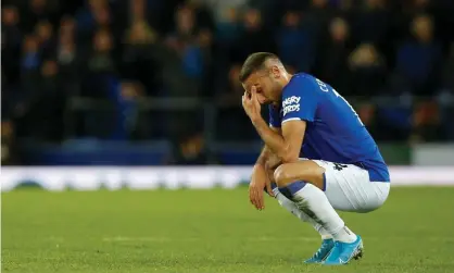  ??  ?? Everton’s goalscorer Cenk Tosun reacts at the end of an emotional contest. Photograph: Andrew Yates/Reuters