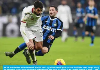  ??  ?? MILAN: Inter Milan’s Italian midfielder Stefano Sensi (C) collides with Cagliari’s Italian midfielder Paolo Farago during the Italian Cup (Coppa Italia) round of 16 football match Inter Milan vs Cagliari at the San Siro stadium in Milan. —AFP