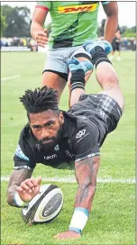  ??  ?? Warriors’ Niko Matawalu grabs a try