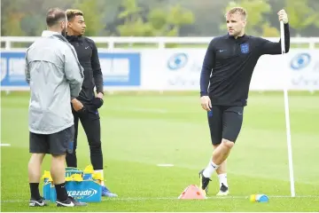  ??  ?? Luke Shaw (right) takes part in an open training session at St George’s Park in Burton-on-Trent, central England. — AFP photo