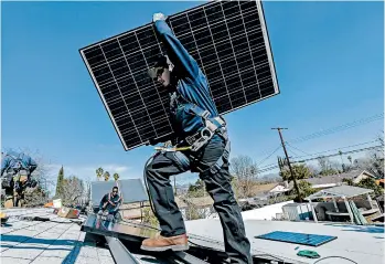  ?? IRFAN KHAN/LOS ANGELES TIMES ?? What’s unique about 100 percent clean energy, supporters say, is it’s caught on in a way other climate policies haven’t.