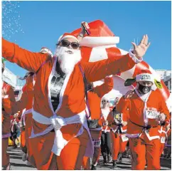  ?? Las Vegas Review-journal File Photo ?? Runners begin the race during The Las Vegas Great Santa Run on Dec. 4, 2021, in downtown Las Vegas.